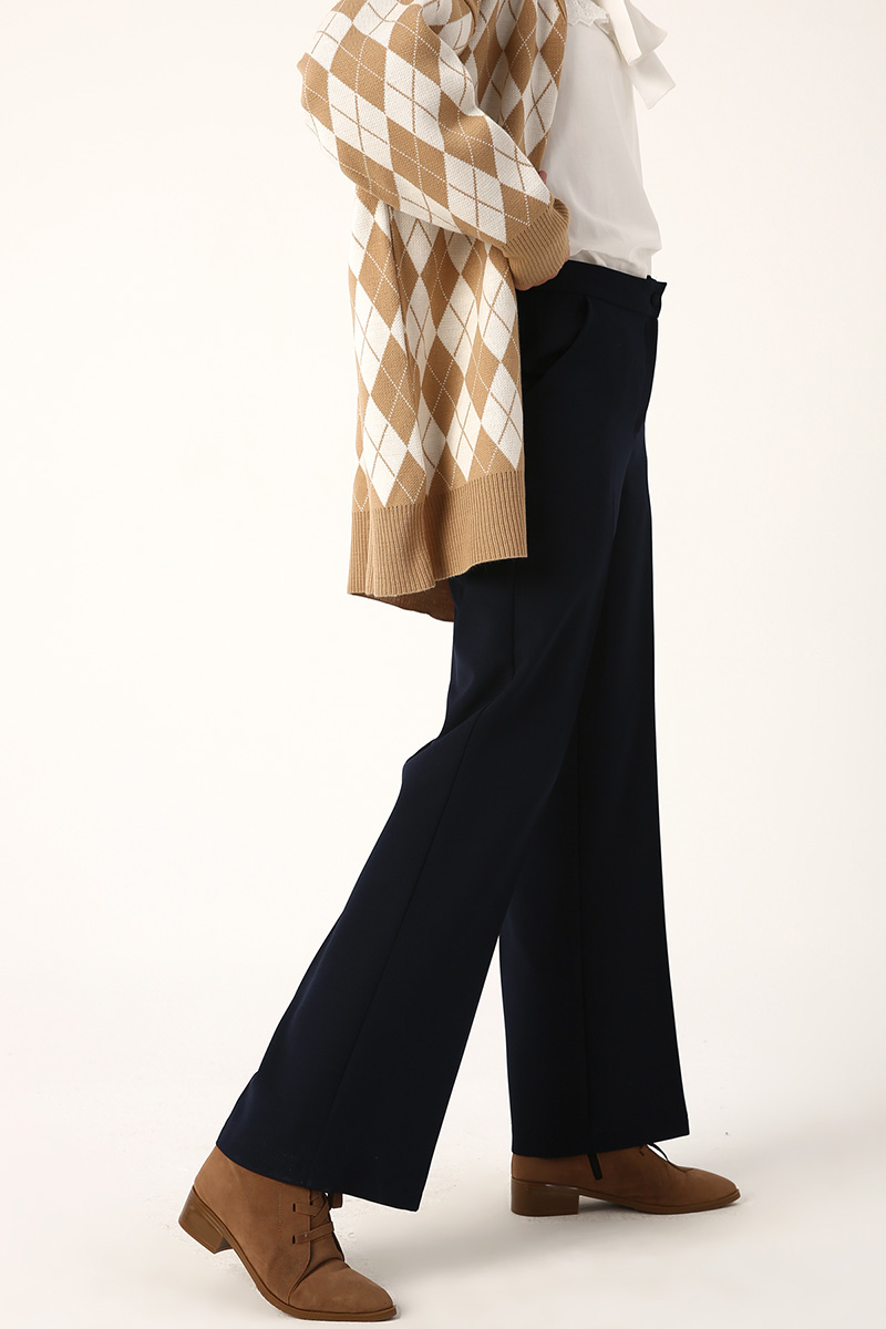 A model wears 27937 - Pants - Navy Blue, wholesale Pants of Allday to display at Lonca