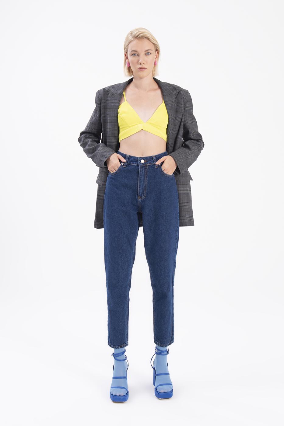 A wholesale clothing model wears High Rise Denim Pants, Turkish wholesale Poncho of BSL