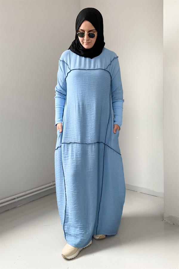 A model wears BER10040 - Overlock Detail Balloon Dress Blue, wholesale Dress of Berika Yıldırım to display at Lonca