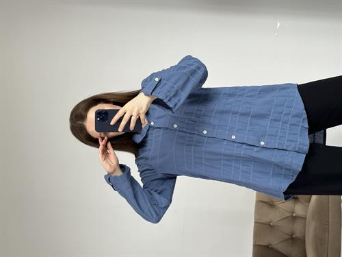 A model wears BER10151 - Short Shirt - Blue, wholesale Shirt of Berika Yıldırım to display at Lonca