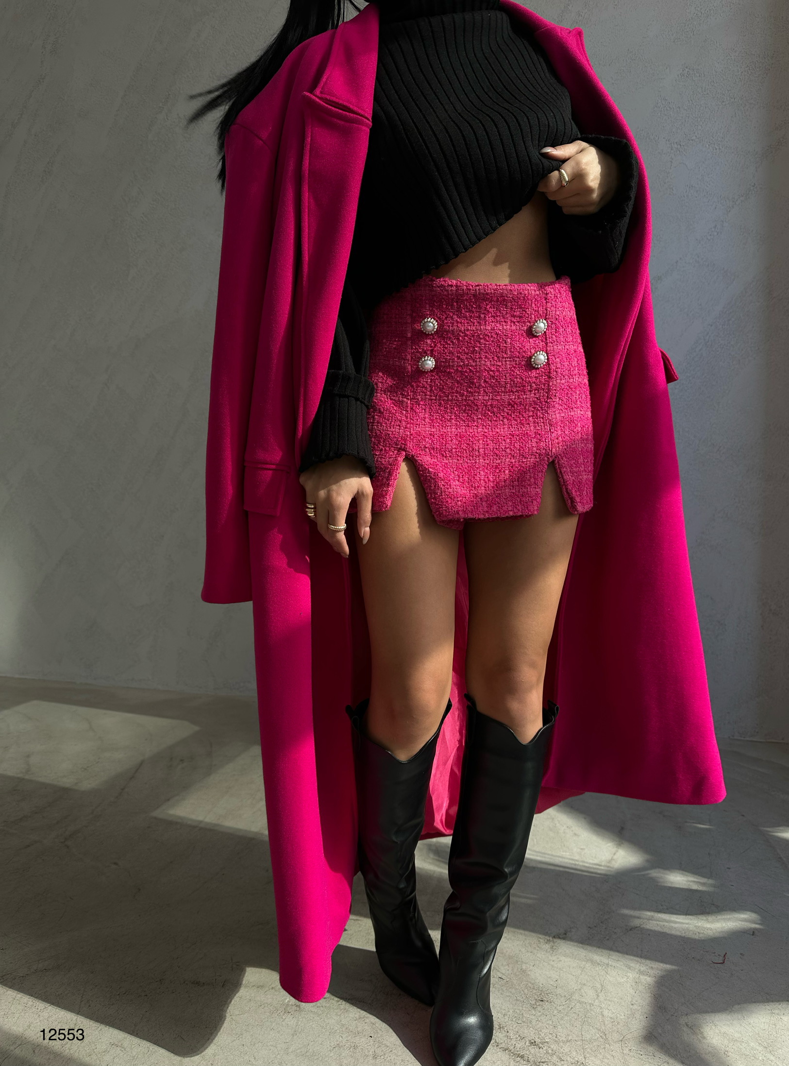 A model wears 37836 - Short Skirt - Pink, wholesale Skirt of Black Fashion to display at Lonca