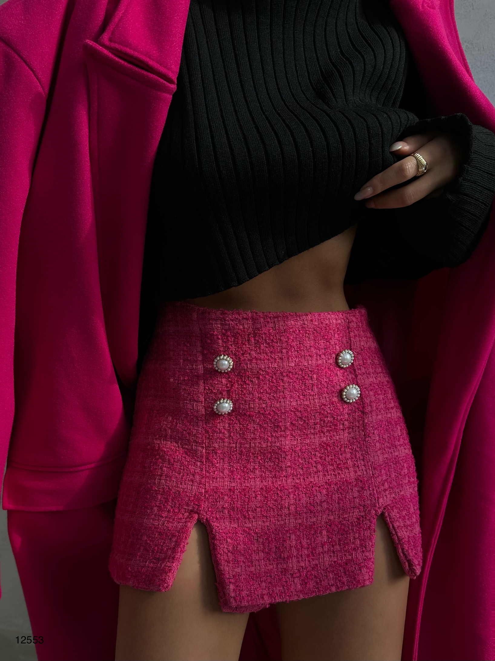 A model wears 37836 - Short Skirt - Pink, wholesale Skirt of Black Fashion to display at Lonca