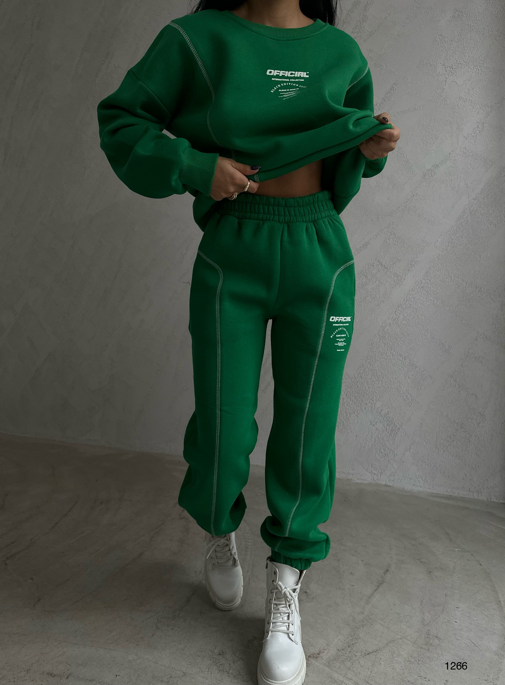 A wholesale clothing model wears Tracksuit - Green, Turkish wholesale Tracksuit of Black Fashion
