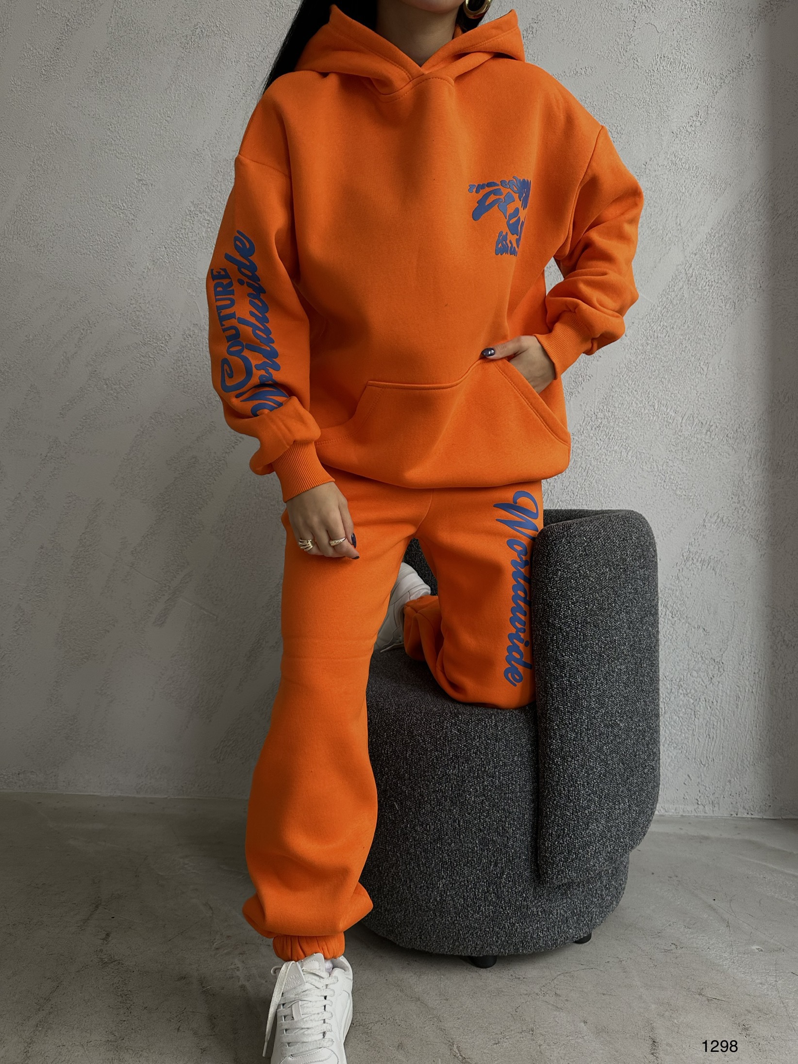 A wholesale clothing model wears Tracksuit - Orange, Turkish wholesale Tracksuit of Black Fashion
