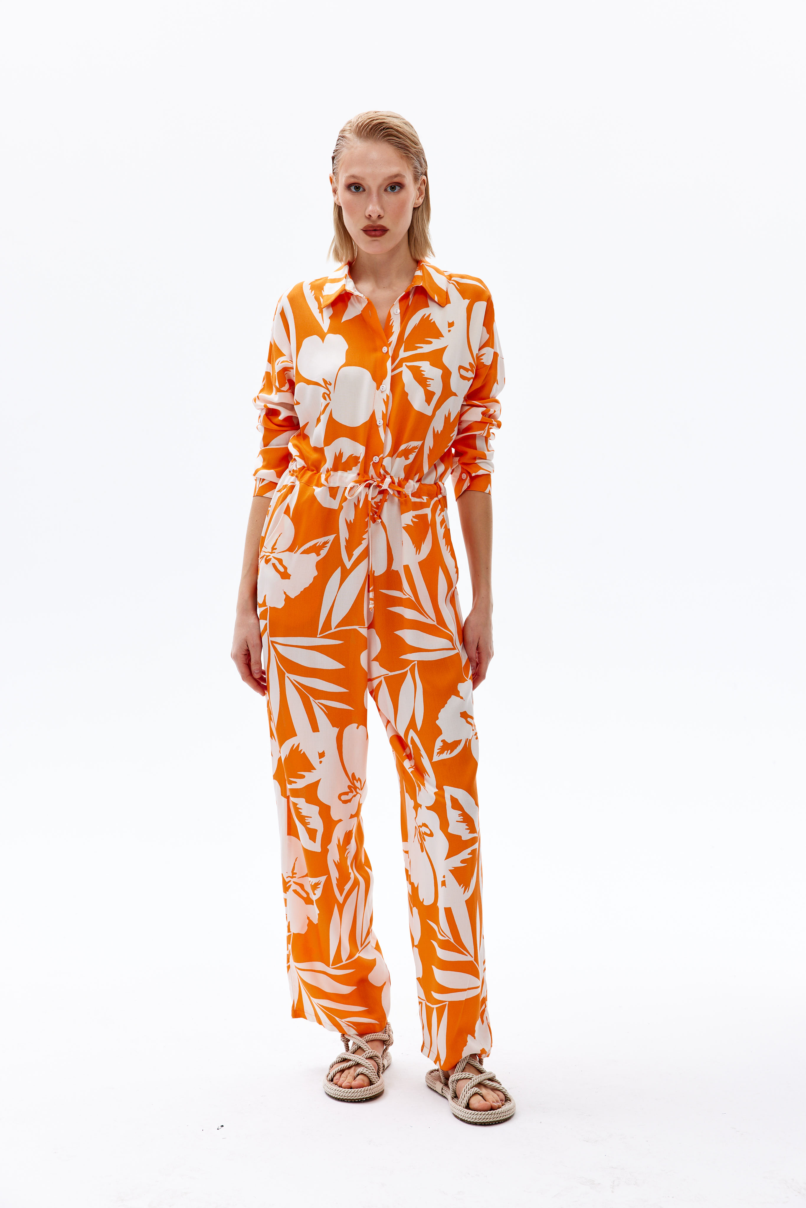 A model wears 44112 - Overalls - Orange, wholesale Jumpsuit of Cream Rouge to display at Lonca
