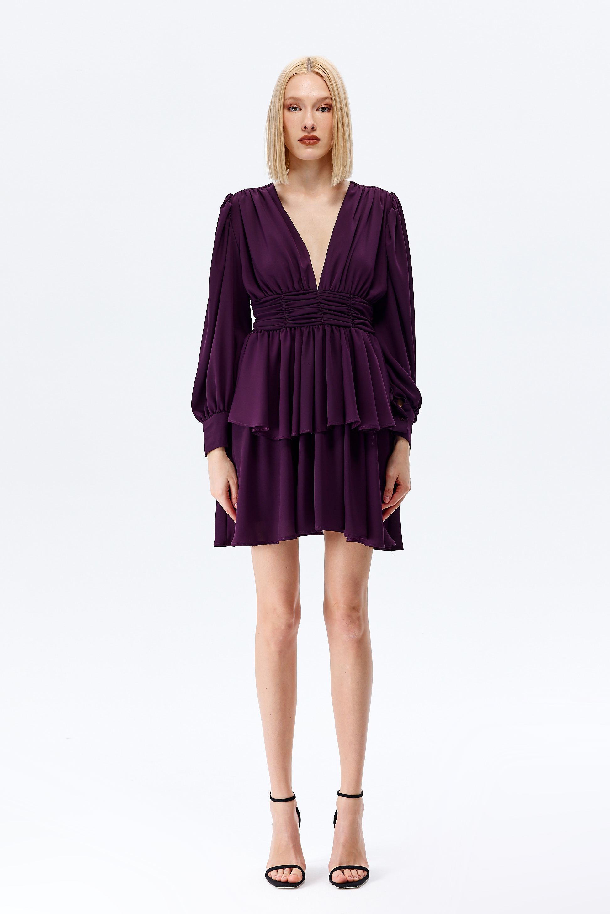 A model wears CRO10105 - Dress - Purple, wholesale Dress of Cream Rouge to display at Lonca