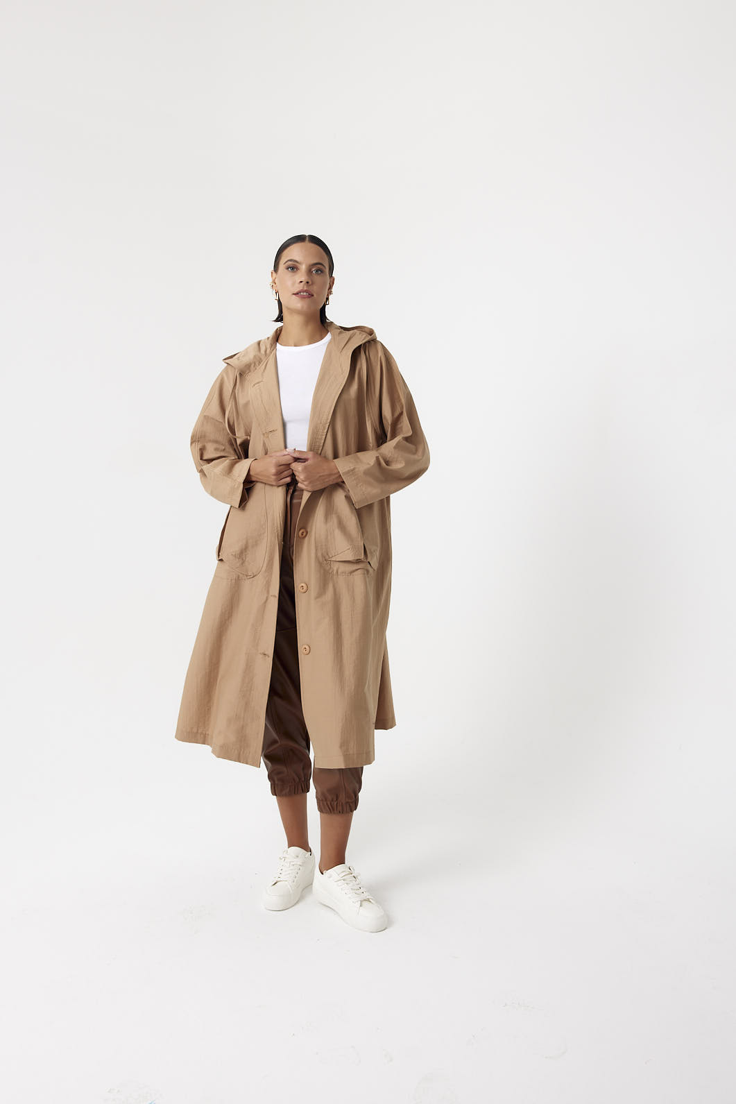 A wholesale clothing model wears Bag Pocket Hooded Raincoat - Camel, Turkish wholesale Raincoat of Cream Rouge