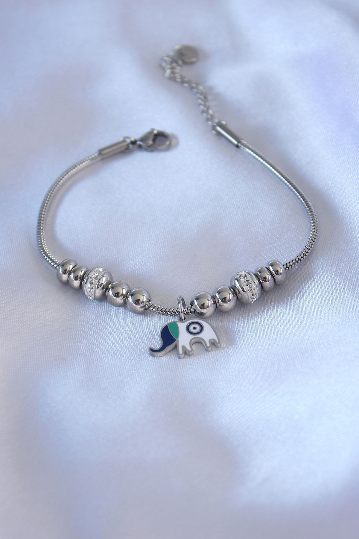A wholesale clothing model wears EBJ13358 - 316L Steel Silver Color Elephant Figure Zircon Stone Detail Charm Women's Bracelet, Turkish wholesale Bracelet of Ebijuteri