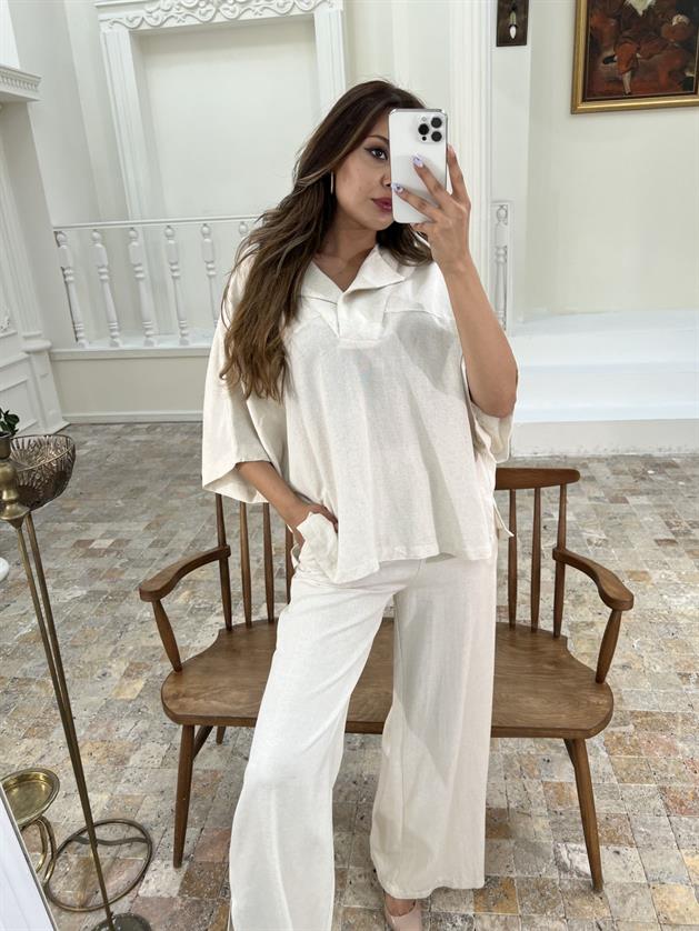 A model wears FME11427 - Suit - Beige, wholesale Suit of Fame to display at Lonca