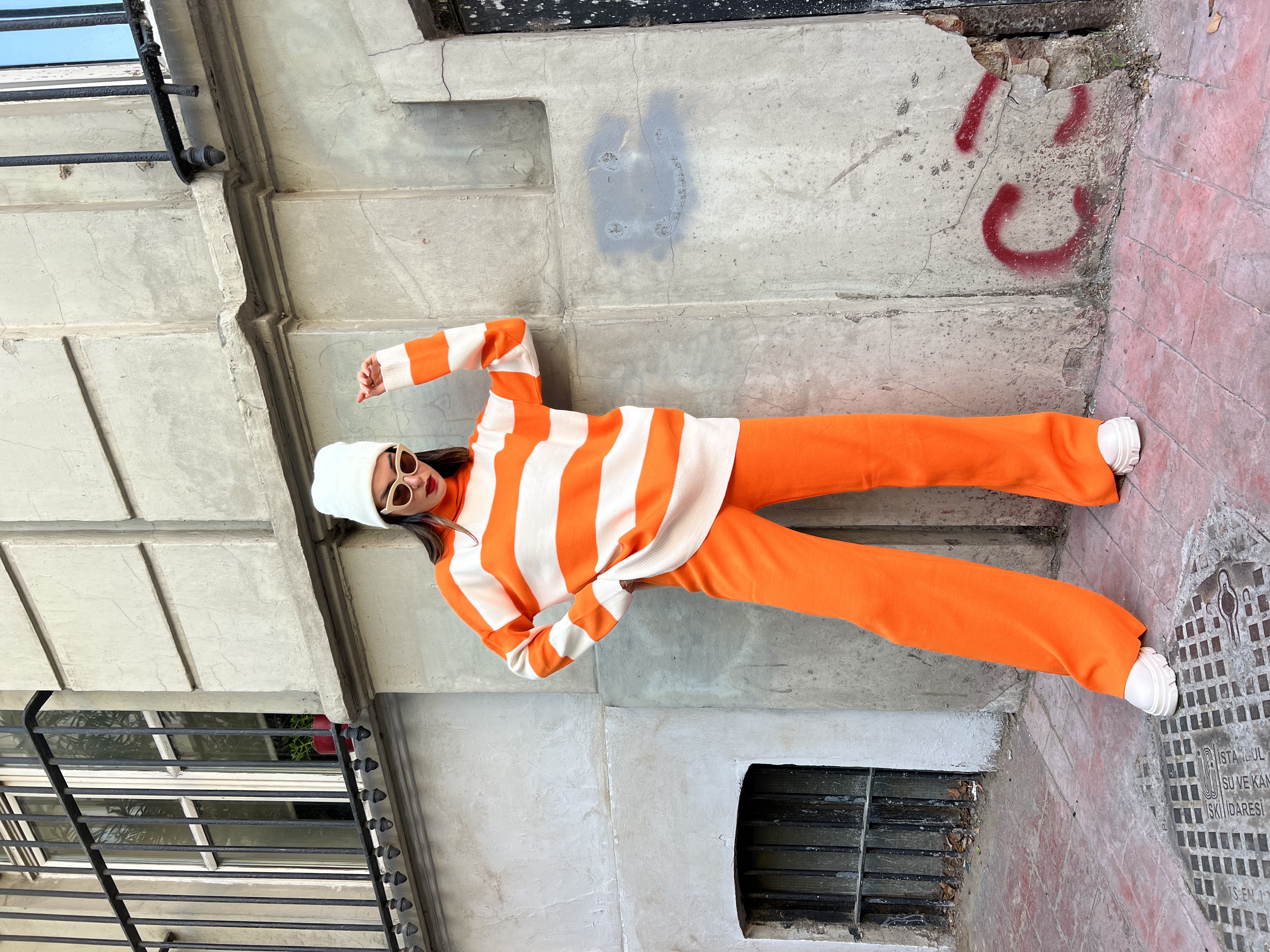 A wholesale clothing model wears Orange Turtleneck Striped Knitwear Top-Top Set, Turkish wholesale Suit of First Angels