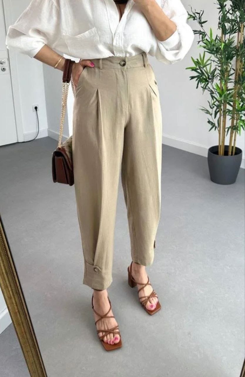 A model wears FLW10010 - Trousers - Stone Color, wholesale Pants of Flow to display at Lonca