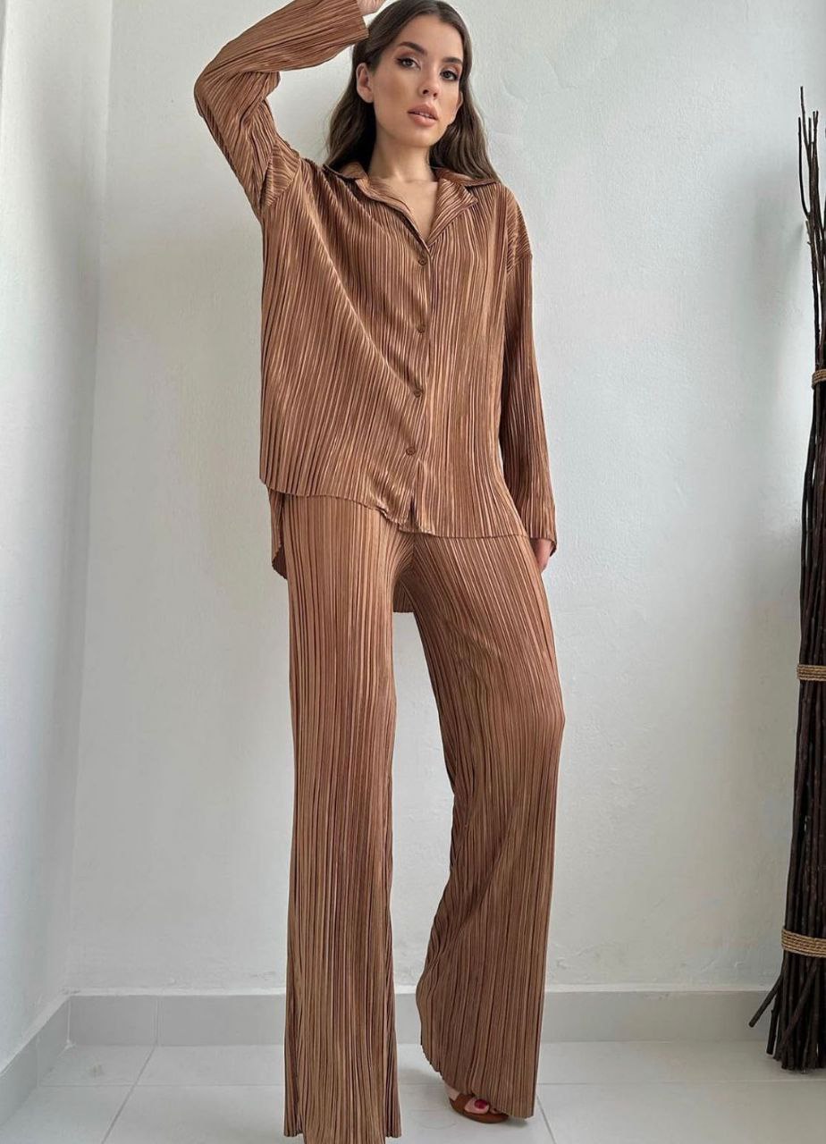 A model wears FLW10046 - Pleated Suit - Brown, wholesale Suit of Flow to display at Lonca