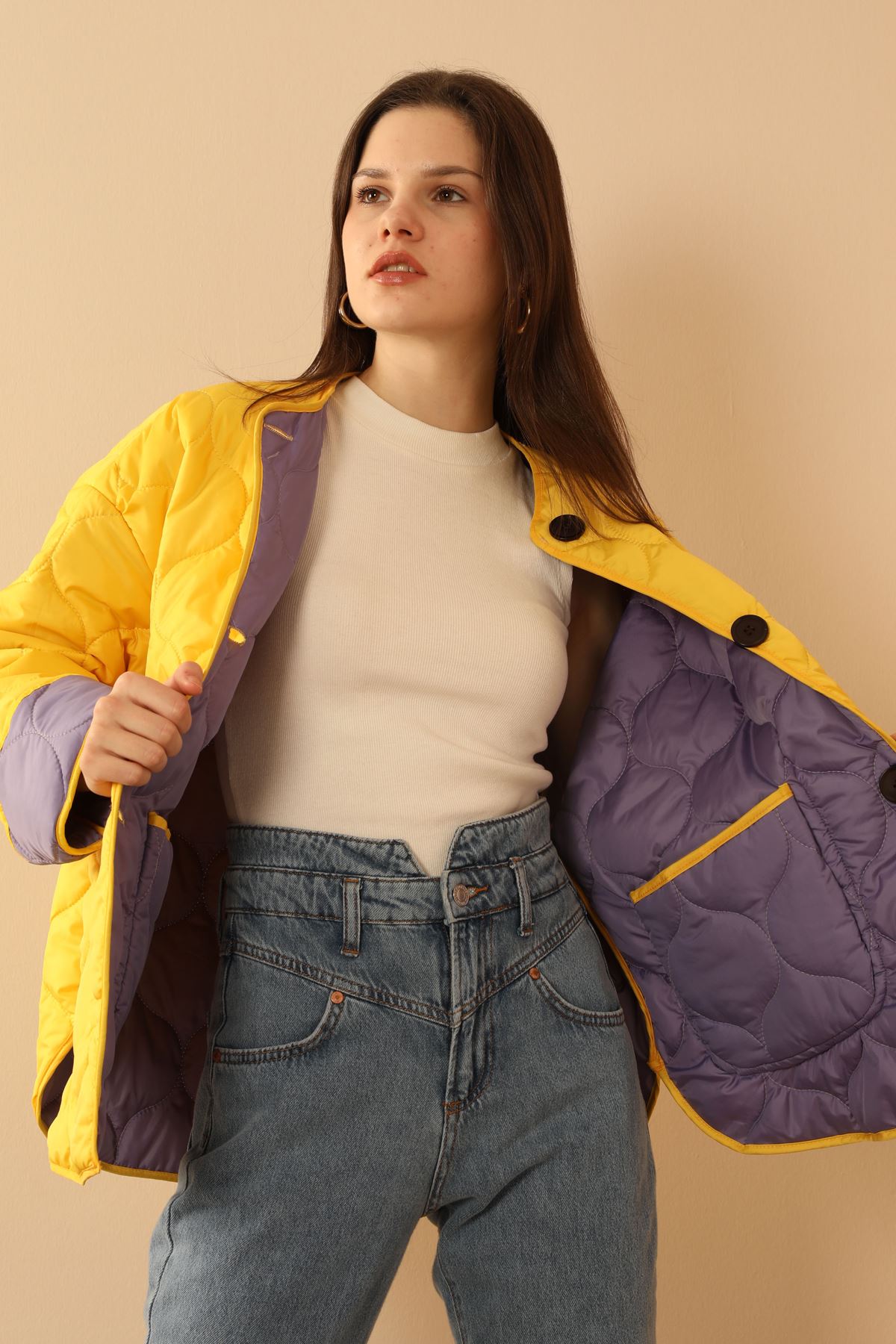 A model wears 33822 - Double Sided Coat - Yellow And Lilac, wholesale Coat of Kaktus Moda to display at Lonca