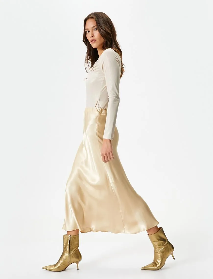A wholesale clothing model wears A-Line Standard Waist Midi Satin Skirt - Camel, Turkish wholesale Skirt of Koton