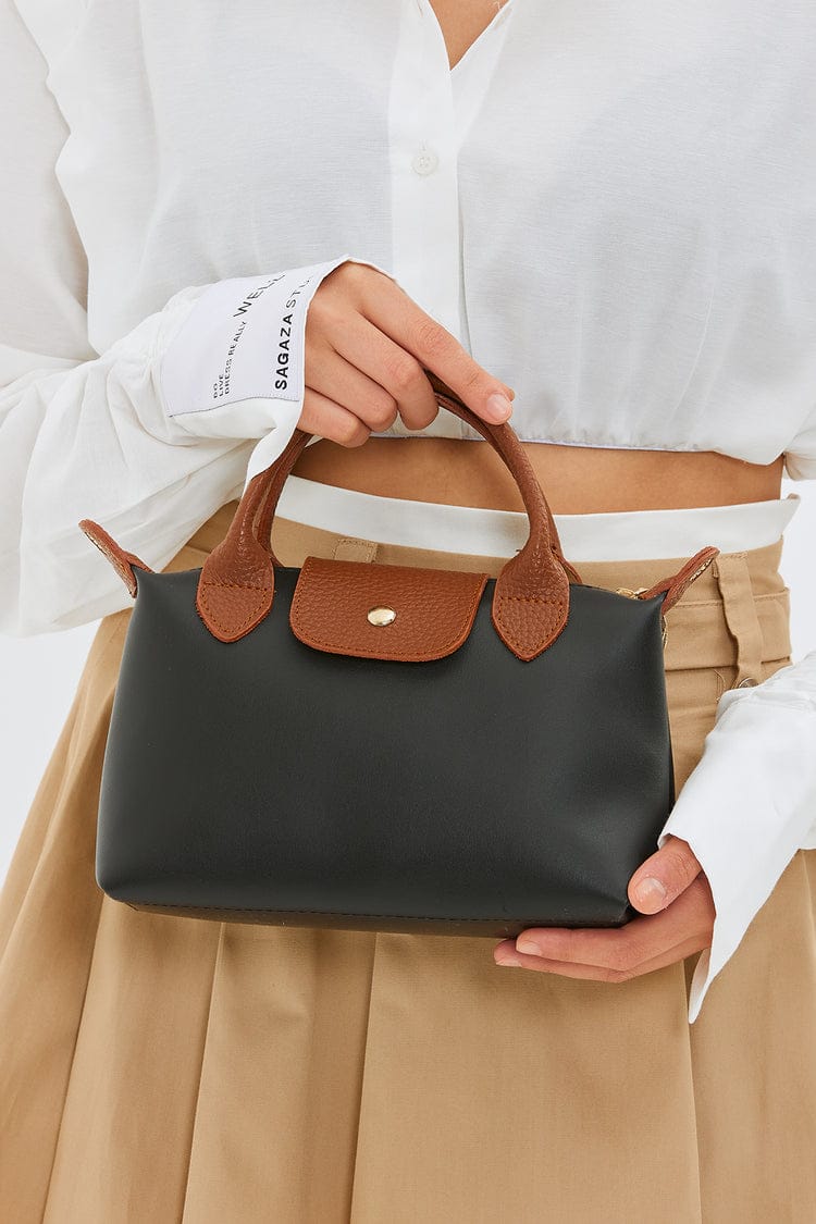 A wholesale clothing model wears Kuxo Women's Shoulder Bag, Turkish wholesale Bag of Kuxo