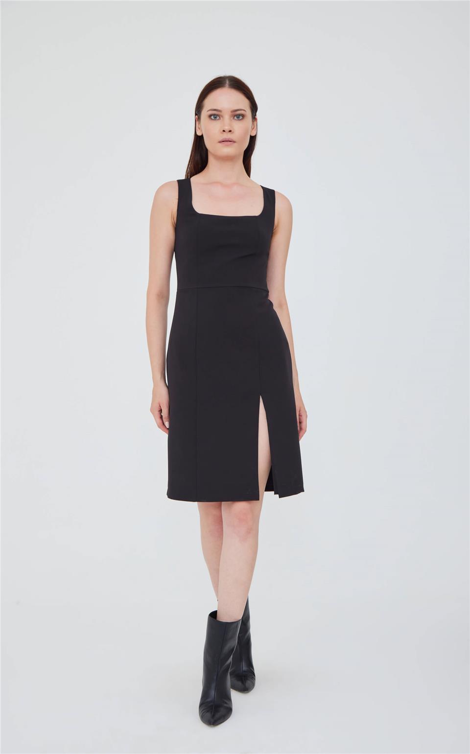 A model wears LFN10779 - Femınıne Mıdı Dress Wıth Slıt Deep Ink Black - Siyah, wholesale Dress of Lefon to display at Lonca