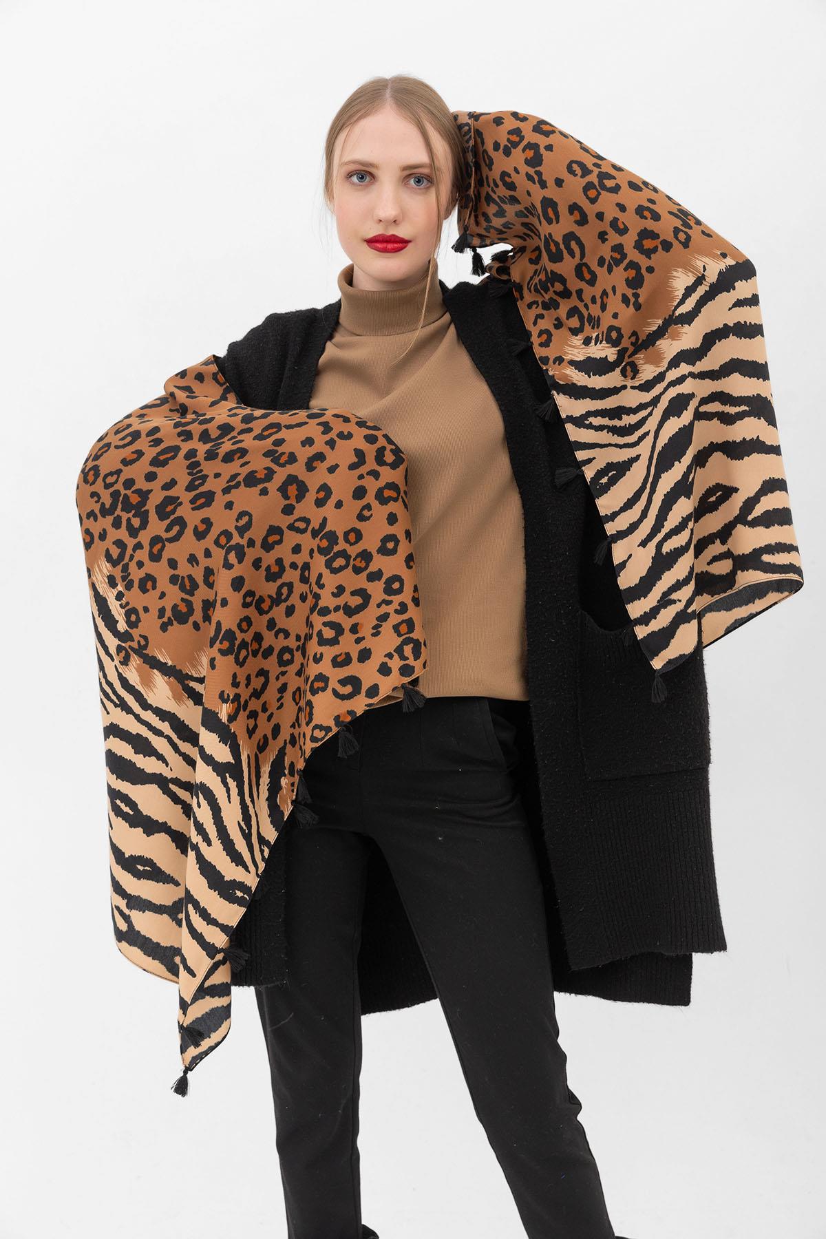 A model wears NSV11129 - Leopard Zebra Patterned Tassel Shawl - Brown, wholesale Shawl of Nesvay to display at Lonca
