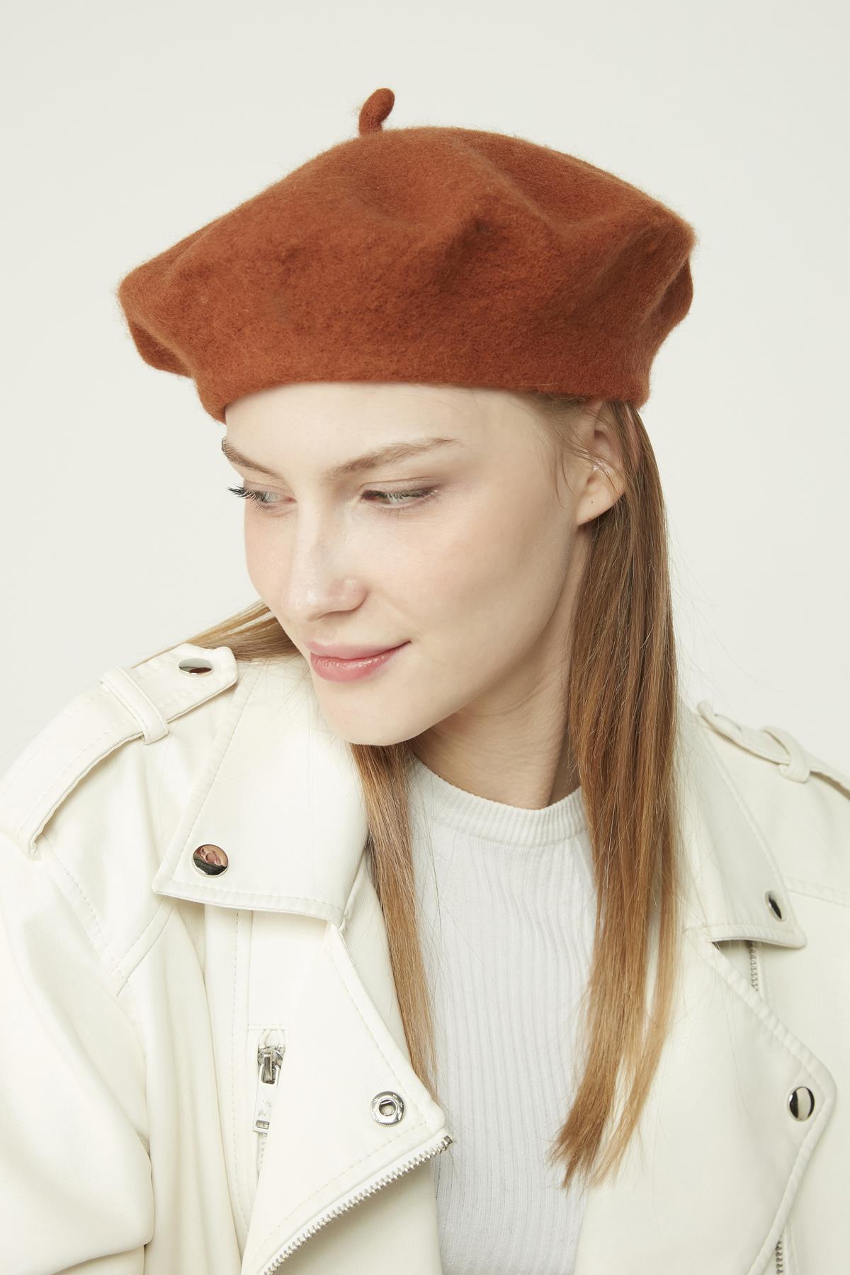 A model wears NSV11160 - Wool Painter Beret - Tile, wholesale Beret of Nesvay to display at Lonca