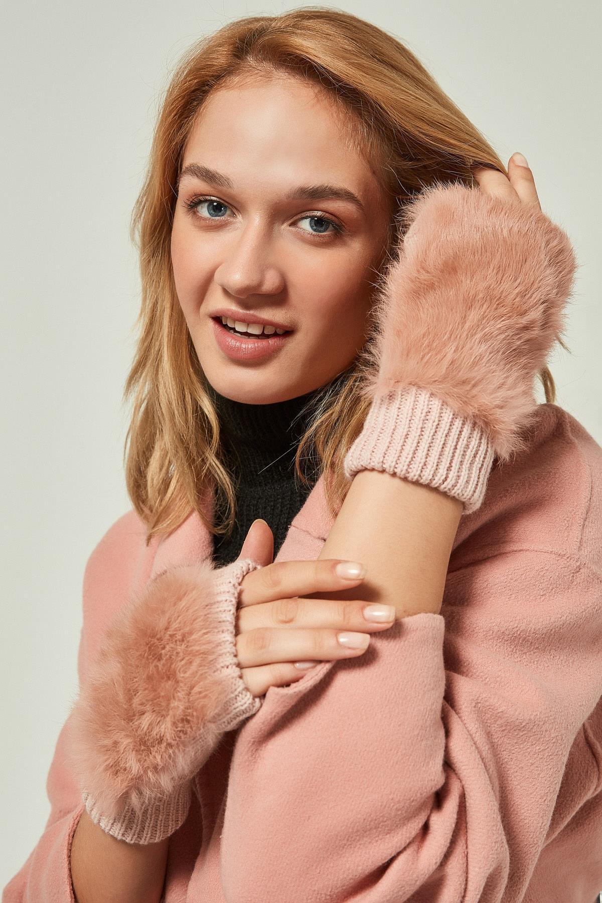 A model wears NSV11233 - Furry Wool Cut-Out Gloves Yl - Pink, wholesale Glove of Nesvay to display at Lonca