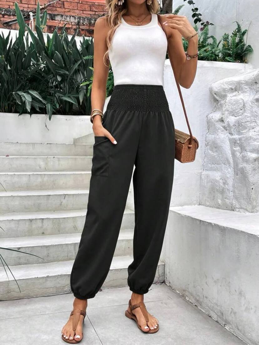 A model wears PBO10185 - High Waist  Elastic Ankles  Pocket Detail Two Thread Women's Trousers, wholesale Pants of Polo Bonetta to display at Lonca