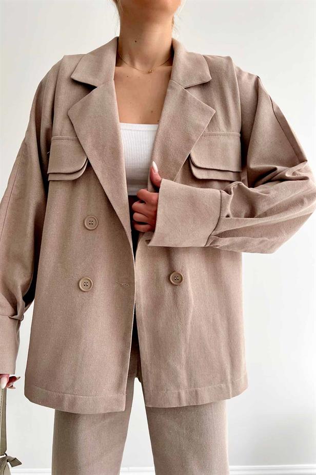 A model wears REY10152 - Double Pocket Flap Linen Jacket - Mink, wholesale Jacket of Reyon to display at Lonca