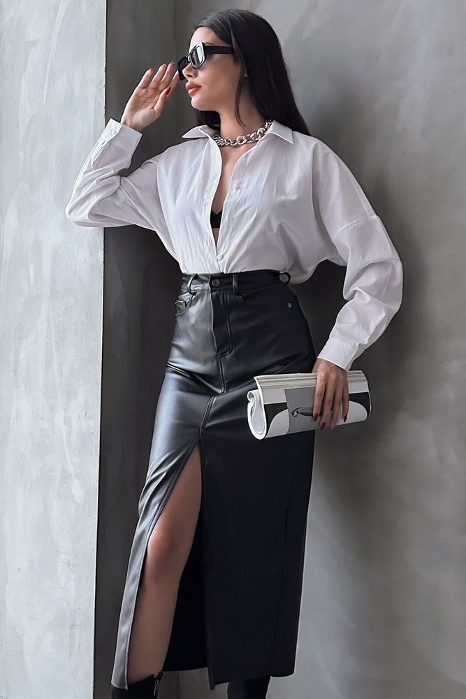 A wholesale clothing model wears Black F 1569 Leather Skirt, Turkish wholesale Skirt of Topshow