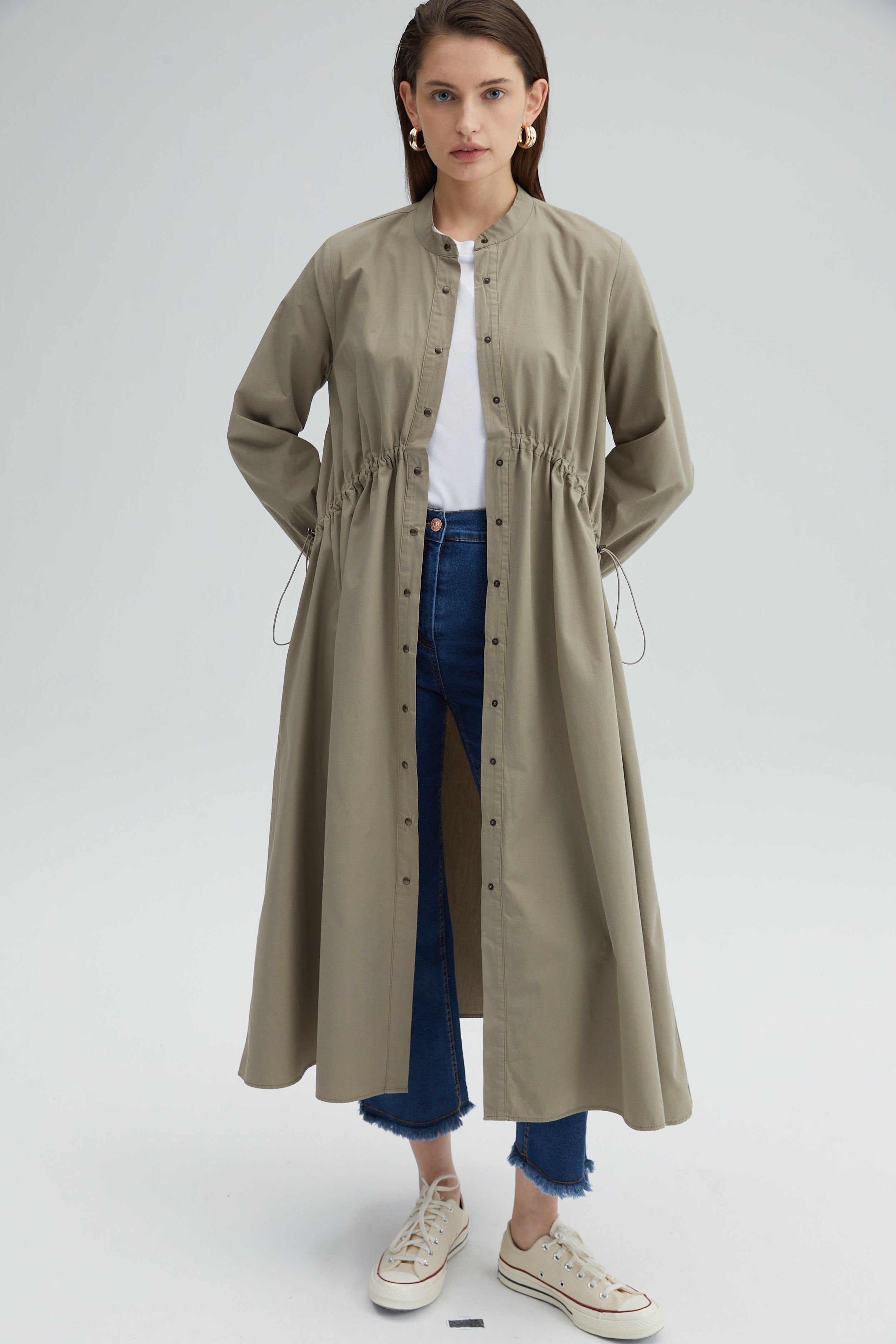 A model wears TOU10805 - Waisted Quilted Oversize Trenchcoat - Khaki, wholesale Trenchcoat of Touche Prive to display at Lonca