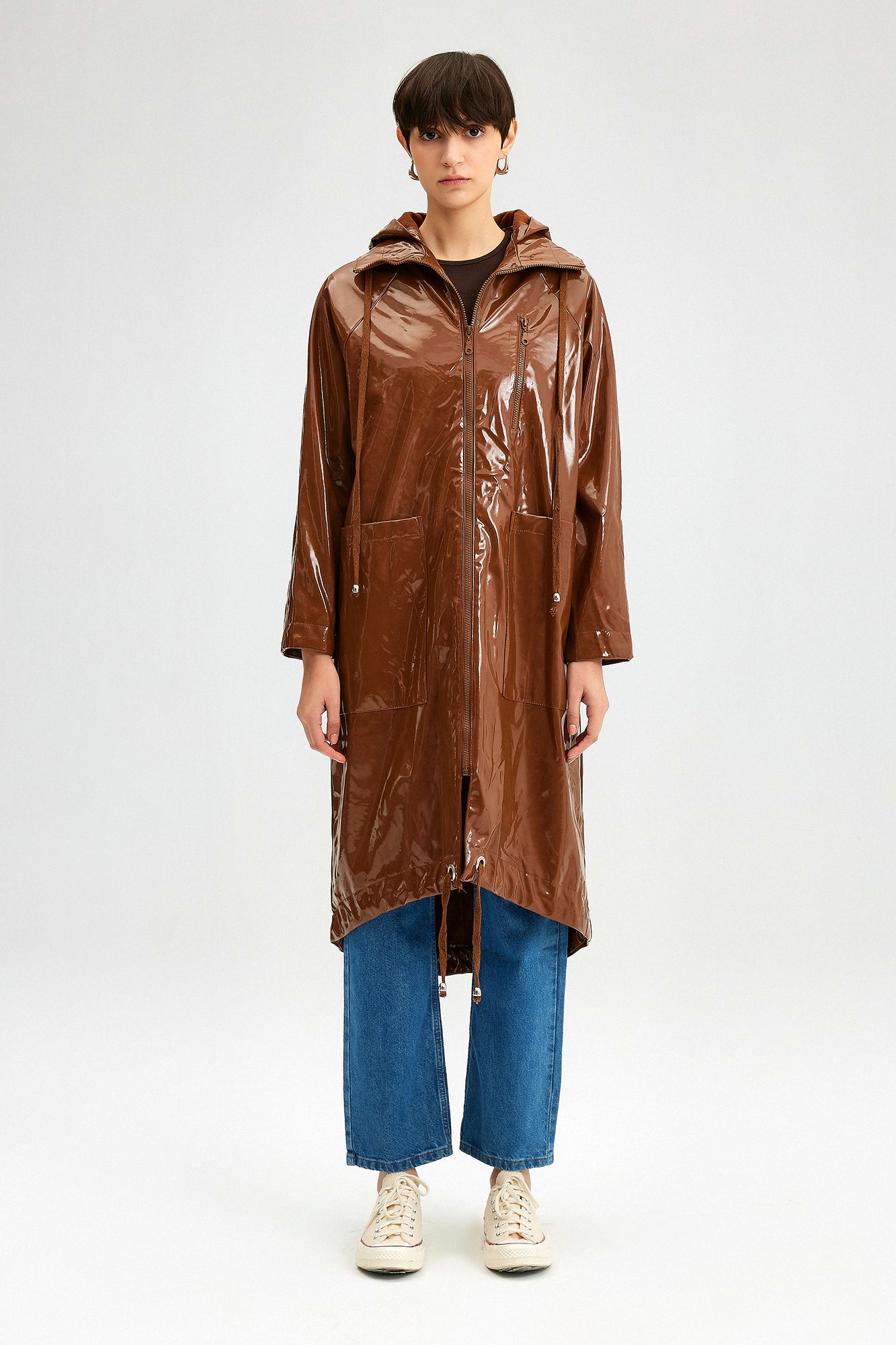 A wholesale clothing model wears Patterned Leather Coat With Hoodie - Camel, Turkish wholesale Raincoat of Touche Prive